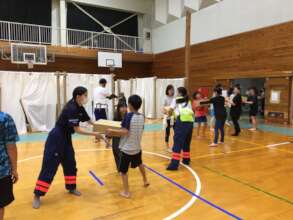 Distributing supplies at evacuation centers