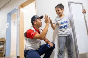 Responder & child affected by Kumamoto earthquake