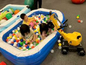 Children play at the Children's Plaza
