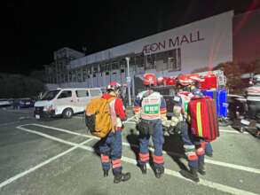 Peace Winds rescuers outside Aeon Mall