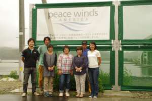 Mari & team at windbreak fence installed by PW