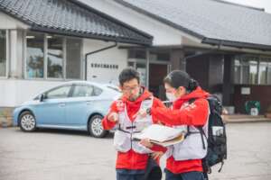 ARROWS staff go door-to-door after the earthquake