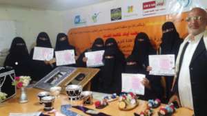 The head of the organization with the trainees at