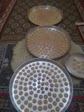 Cakes and biscuits for a wedding made by displaced