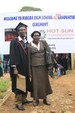 Erasto and his grandma at graduation