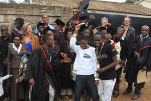 Wilfred celebrates with 2012 Graduating class