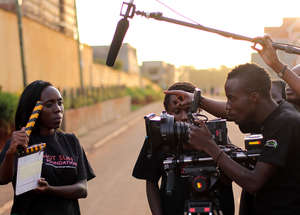 Ronald training other youth at Hot Sun Foundation