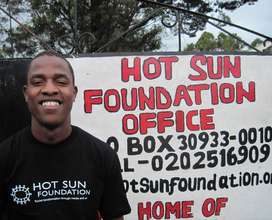 Wicky in front of Hot Sun Foundation, Nairobi