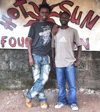 Josphat and Vincent at Hot Sun Foundation office