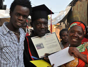 Josphat Keya with KFS graduate Clarence Ilavonga