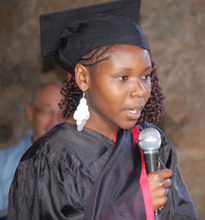 Martha Kisaka, accepts the award for Overall Best