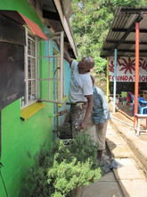 Painting the NEW Hot Sun Foundation office in Kibera