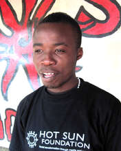 Ronald Omondi outside Hot Sun Foundation office