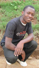 Vincent Oduor outside Hot Sun Foundation Office