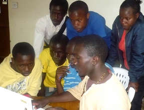Kibera Film School trainees learning editing
