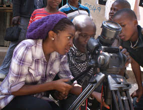 Shirley and Joash, filming in Kibera