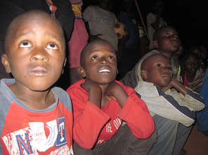 Children watching TOGETHERNESS SUPREME