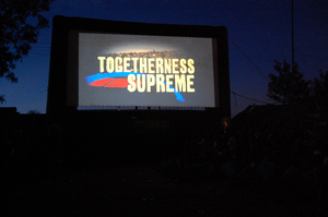 TOGETHERNESS SUPREME  outdoor screening in Kibera