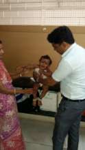 A child is being assessed for making the device