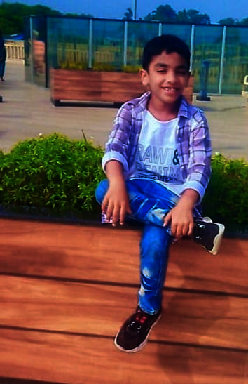 Prithvin ready for a friend's birthday party