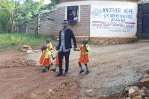 Jonathan walking children to school