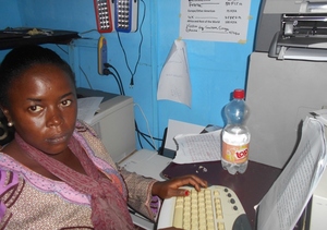Linda on Desk at the Center