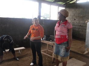 Johanna and a teen mother doing the mountain pose