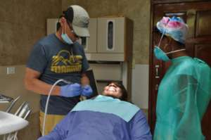 Patient being fitted for a new, 3D printed crown!