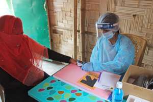 IRC midwife conducts client checkup in Bangladesh