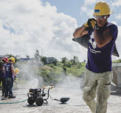 Volunteers doing concrete work