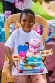 Beneficiaries receiving scholastic materials