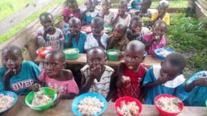 Children having a meal during school time