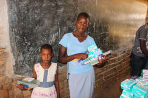 Beneficiary after receiving scholarstic materials