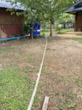 The very very long hose for water to the children