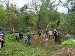 Friends and family join in to help prep the fields