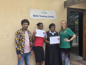 Graduates with Teacher James