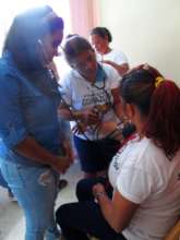 A group practicing taking blood pressure.