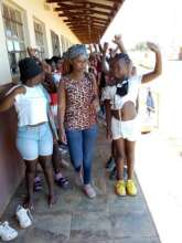 Mbali teaches the choristers to file in and out!