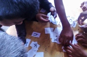 Students learning the alphabet