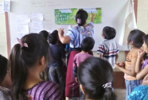 Students participate in an activity with Lidia