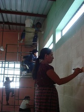 Teacher Painting the Library