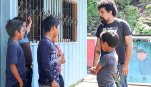 Students talking to Juan Serrano Echeverria