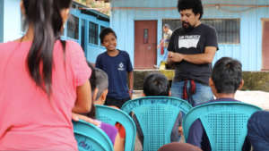 Fourth grader, Jose, participating in the workshop