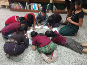 Older students participate in a writing activity