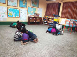 Students work on a group activity during recess