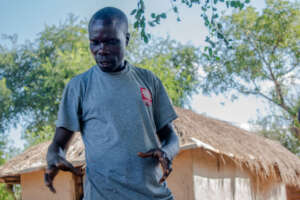 Refugee Amule has planted several hundred trees