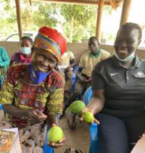 Proud farmer with her fruit