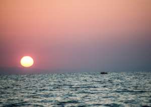 "Dinghy at sunrise" Photo: Roman Kutzowitz