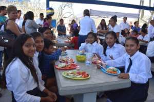 School girls enjoying their meal
