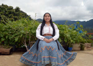 Evelia wearing her traditional dress